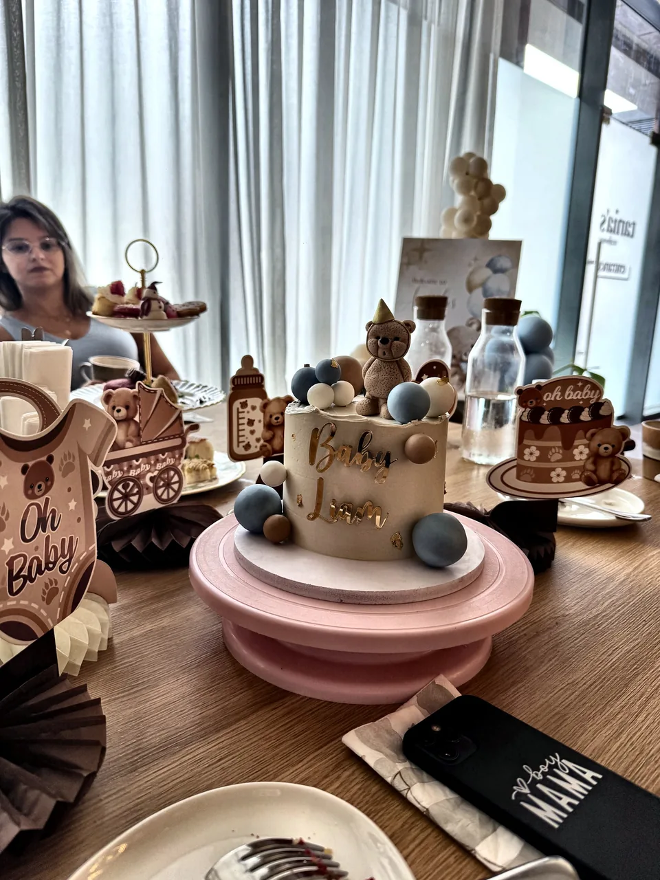 Baby shower table with the personalised Baby Liam cake, teddy bear details and an Oh Baby sign