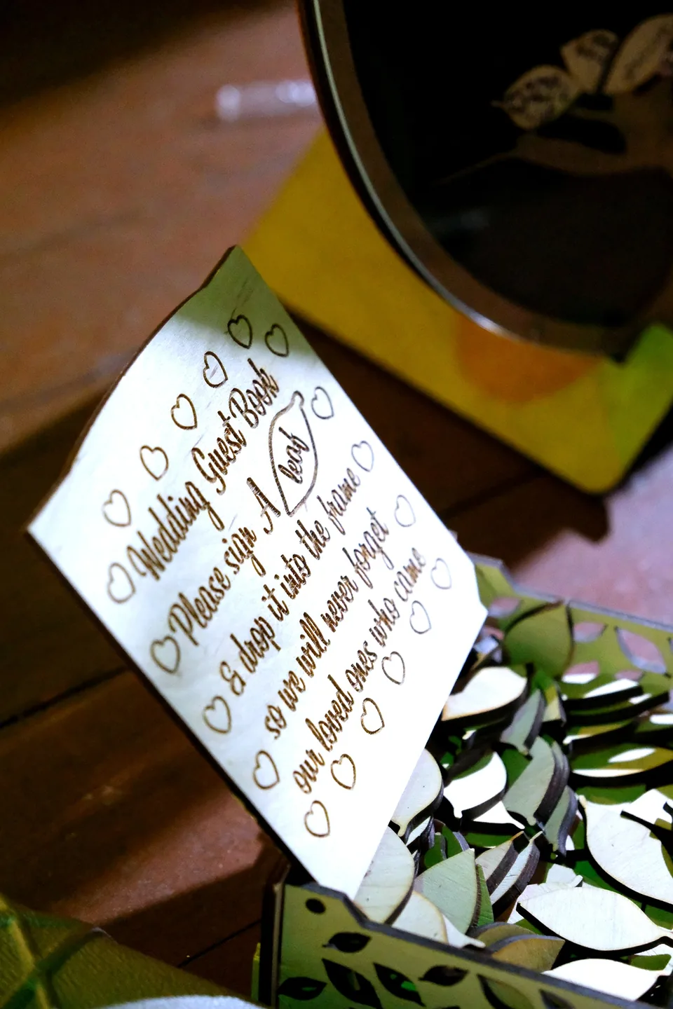 Personalised wedding guest book sign inviting guests to sign and leave a note